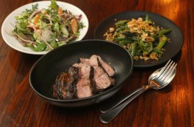 The lamb rump served with a vegetable salad and asparagus.