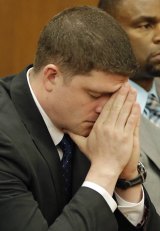 Michael Brelo reacts after he was acquitted of the manslaughter of two unarmed people in Cleveland.