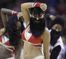 Unusual look for a cheerleader: Houston Rockets Power Dancers wearing beards mimicking Rockets guard James Harden during a timeout against the Cleveland Cavaliers.