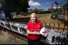 Labor candidate for Wendouree Sharon Knight hands out voting cards at the Ballarat North Primary School.
