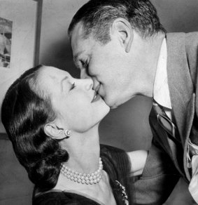 Caught on film: Lovers Laurence Olivier and Vivien Leigh pucker up after Leigh's Oscar win in 1952.