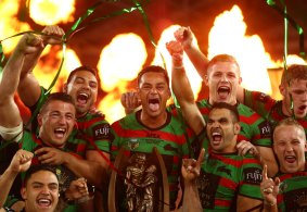 Premiers: Former Rabbitohs captain John Sutton, centre, celebrates after winning the 2014 NRL grand final.