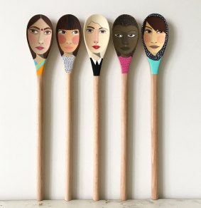 Emma Palmer paints portraits on to wooden canvases, pebbles, wooden spoons and baubles.