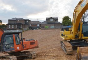 Refilling the giant collapsing excavation in Mount Waverley. 