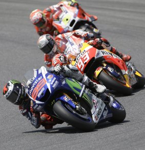 Jorge Lorenzo leads Honda's Marc Marquez, and Ducati riders Andrea Dovizioso and Andrea Iannone during the Italian MotoGP.