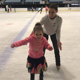 Former Olympian Joanne Carter on the ice with her cousin Layla.