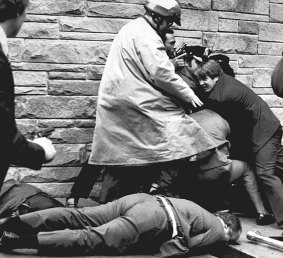 James Brady, Ronald Reagan's press secretary, lies wounded on the sidewalk outside a Washington hotel on March 30, 1981.