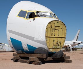 The nose of a scrapped aircraft in a boneyard.