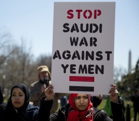 Protesters gather along Lafayette Square near the White House, Sunday, March 29, 2015, in Washington, to call for a halt to foreign intervention in Yemen.