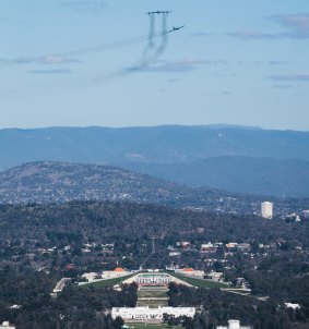 A view over Canberra as the Vietnam era USAF B-52 Bombers fly over.