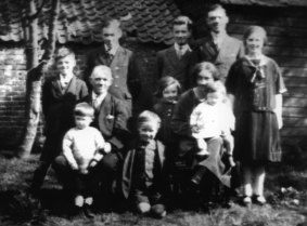 Original inhabitants of Captain Cook's Cottage in England. An old Simpson family photograph shows Alan Simpson, left front, and his sister Ivy Hynes, middle centre, in England 70 years ago.