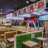 The Hong Kong bus that serves as Kowloon Cafe's bar had to be cut into six pieces and reassembled on site.