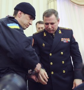 Emergency Services Ministry deputy Vasyl Stoyetsky is arrested during a Cabinet meeting broadcast live on TV. 