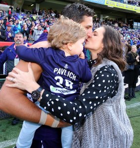 Matthew Pavlich is greeted by his wife Lauren and children Harper and Jack before walking out to play his 350th game.