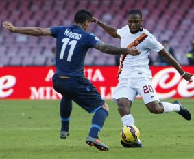 Roma's Seydou Keita fights for the ball the Napoli's Christian Maggio.