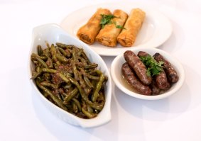 Loubyeh (green beans) with ladies' fingers (filo) and makaneek (spiced lamb sausage).