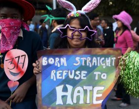 Members and supporters of the lesbian, gay, bisexual, transgender (LGBT) community take part in a gay pride parade in New Delhi on Sunday. 