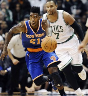 On the loose: Knicks young gun Iman Shumpert sprints away from Boston's Jared Sullinger during their pre-season clash in Louisville.
