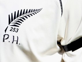 Brendon McCullum honours deceased Australian cricketer Phillip Hughes with his initials below the silver fern during his innings in Sharjah.