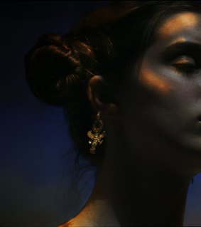 One of Bill Henson's photographs shows a young model wearing a pair of ancient earrings.