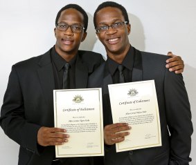 Seeing double... identical twins Allen and Allan Dube will become riflemen in the Australian army.