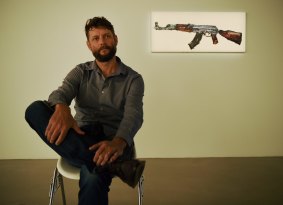 Artist Ben Quilty in front of <i>Gun (Large) 2014</i>, one of Myuran Sukumaran's paintings that were part of the <i>Another Day In Paradise</i> exhibition of Myuran's art that Quilty curated last year.