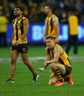 Mitchell and Cyril Rioli after the Hawks' loss to the Western Bulldogs in the finals, a game that may be Mitchell's last for the club.