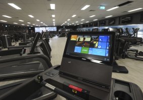 The gym floor has about 100 state-of-the-art exercise machines.