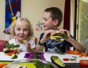 Imogen, 4, and Xavier, 7, Taylor, of Evatt, making healthy sandwiches for lunch. 