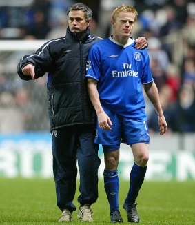 The best: Jose Mourinho (left) consoles Damien Duff after an FA Cup game in 2005.