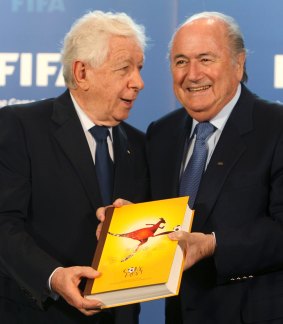 Frank Lowy submits Australia's bid book for the 2018 or 2022 World Cup in Zurich in May 2010.