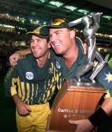 Shane Warne and Ricky Ponting celebrate winning the final of the Carlton and United One Day International Cricket tri-series against England.