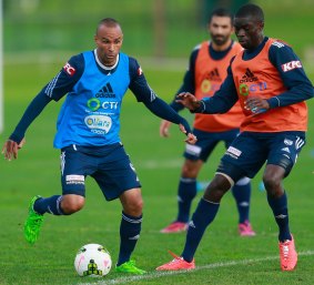 Archie Thompson and Jason Geria at a training session on Tuesday.