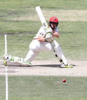 Runs: Jake Lehmann of South Australia sweeps one away to the boundary.