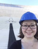 Emily Petroff on the dish of the telescope.