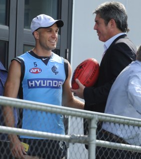 Chris Judd with Stephen Kernahan after training in March 2013.