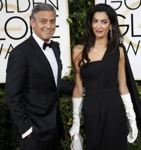 Tell someone who cares: Amal Clooney wore white gloves, which was apparently 'a moment'. 