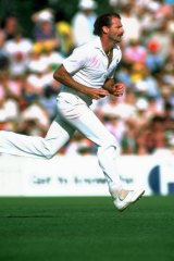 Dennis Lillee comes off the long run.