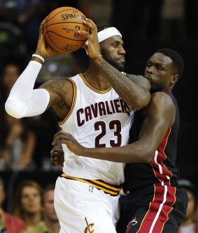 Back home: Cleveland star LeBron James takes on his old team Miami in the pre-season.