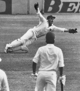 John Maclean claims a catch down the legside off Rodney Hogg's bowling.