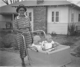 Mrs Buttery with the Hill twins outside a Tocumwal house in O'Connor, 1951. Hill Collection.