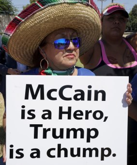 A protester awaits the arrival of Donald Trump in Texas last week.