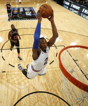 Star on the rise: John Wall dunks the ball during the first half of the NBA All-Star game in New York. 