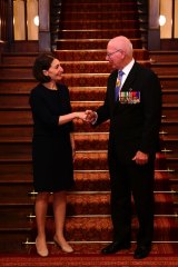 Gladys Berejiklian with Governor David Hurley after being sworn in as Premier.