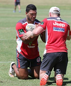 Working hard: Dragons utility back Taane Milne.