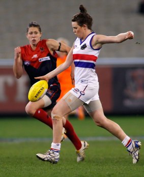 Elise O'Dea representing the Western Bulldogs in 2013. This year she will play with Melbourne Demons.