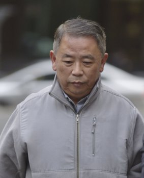 Albert Ooi was sentenced to eight years in jail for conspiracy to defraud and taking a secret commission