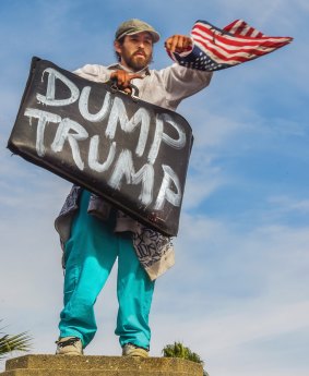 A protester demonstrates in an anti-Trump protest against President-elect, Donald Trump.