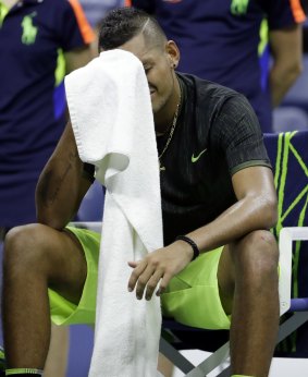 Emotional: Kyrgios appears to cry between games before his injury retirement.