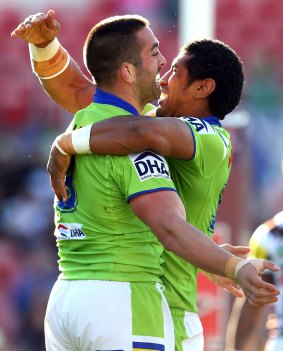 Paul Vaughan and Sia Soliola celebrate a try during the 34-24 win over the Panthers in round 20.